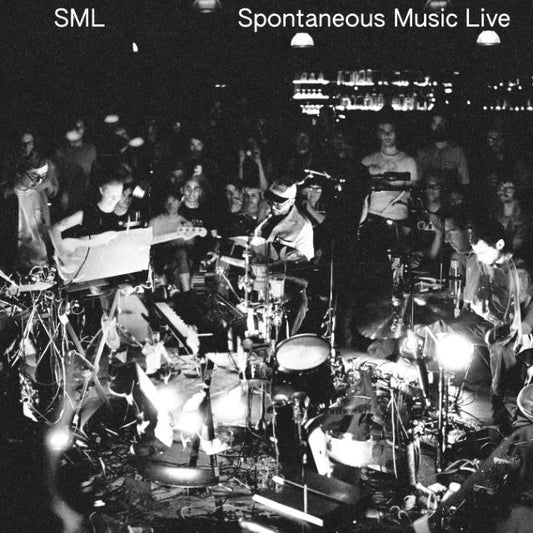 Image of Front Cover of LP - NEW/NEW - SML, Spontaneous Music Live (International Anthem; IARC112LP, Europe 2026), , Spontaneous Music Live contains two side-length pieces of unedited improvisation, recorded live at Los Angeles venue Zebulon during SML's December 2025 three-night residency, just weeks after the release of the band's second album HOW YOU BEEN. It was recorded and mixed live to stereo tape by Bryce Gonzales (the same engineer/wizard known for his gorgeous live captures/mixes of Jeff Parker's 