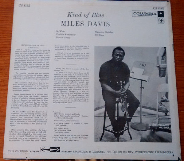 Image of Back Cover of LP - G+/G+ - MILES DAVIS, Kind Of Blue (Columbia; CS 8163, US 1959, Original U.S. pressing), Record has hairlines in line with a VG but there's a patch of side 1 that looks like it's been stained - does not clean off. This patch provides audible crackle, other pops and crackle too elsewhere. Side 2 has less surface noise. Sleeve has edgewear and spotty ringwear. Discolouration to rear sleeve.,  - 2226357E