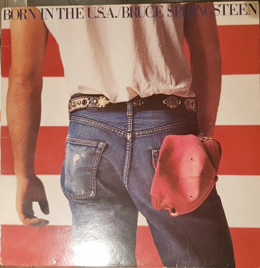 Image of Front Cover of LP - VG/VG+ - BRUCE SPRINGSTEEN, Born In The U.S.A. (CBS Orange/Yellow; 86304, UK 1984, Inner & Insert, No Barcode, CBS Inc at Bottom of Label, A1/B2 Matrix), Edge wear, sticker residue, writing on Inner,  - 2246315S