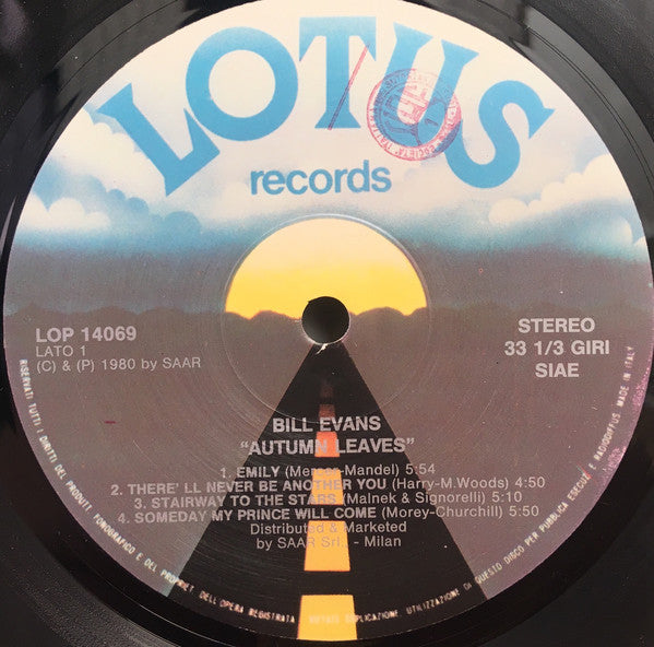 Image of Label Cover of LP - G+/VG - BILL EVANS, Autumn Leaves (Lotus; LOP 14.069, Italy Reissue), Previous owner has written the actual tracklist on the front cover in pen (tracklist on labels and sleeve is very wrong with only 3 songs listed accurately.) Light hairlines. Edgewear. Ringwear.,  - 2226418E