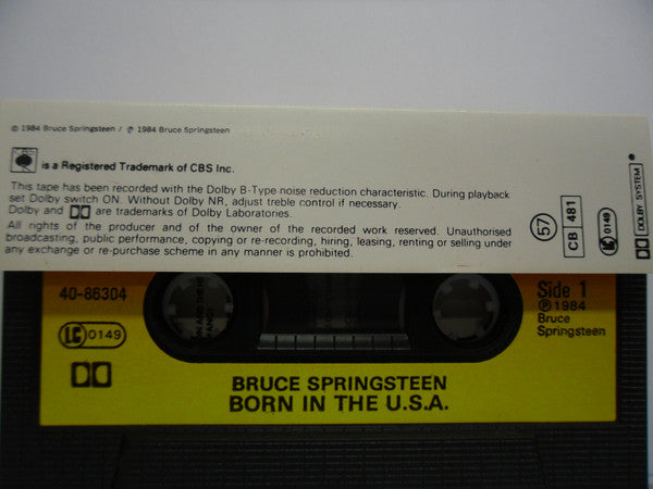 Image of Back Cover of Cassette - VG+/VG+ - BRUCE SPRINGSTEEN, Born In The U.S.A. (CBS Orange/Yellow; 40-86304, UK 1984, Black Shell With Larger Window, No Timing Numbers), ,  - 2316205C