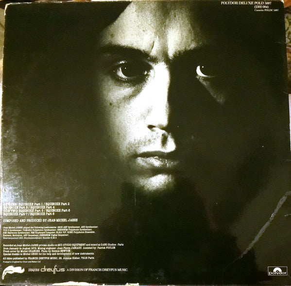 Image of Back Cover of LP - VG/VG+ - JEAN MICHEL JARRE, Equinoxe (Polydor Red Labels With No Space Between Copyrights On Lower Labels; POLD 5007, UK 1970s Reissue, Laminated Sleeve), Just a few small spots of laminate bubbling, Otherwise nice sleeve, Clean disc. ,  - 2316477C