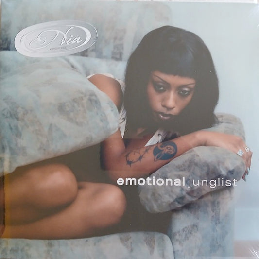 Image of Front Cover of LP - NEW/NEW - NIA ARCHIVES, Emotional Junglist (Island; 8835303, Europe 2026, Gatefold, Printed Inner, Custom Sticker, Black and White Vinyl), , Nia Archives returns with Emotional Junglist, an album about love   but not just the shimmering romantic parts. Written throughout 2025   a year that saw Nia fall in, and horrifically back out of, love   each track will encompass something of the experience. Marking her biggest sonic leap to date, her alt-jungle sound honed alongside James 