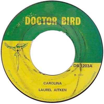 Image of Front Cover of 7" - /G+ - LAUREL AITKEN, Carolina / Kingston Town (Doctor Bird; DB.1203, UK 1969, 4-Prong Centre), Lots of marks, plays with light crackle, very enjoyable; one mark causes a few ticks at the end of side B. Label wear, no centre piece.,  - 2416130C