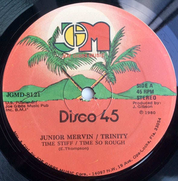 Image of Front Cover of 12" - /G+ - JUNIOR MERVIN / TRINITY, Time Stiff / Time So Rough (Joe Gibbs Music; JGMD-8121, US 1980, Plain Sleeve), Superficial marks and pressing flaws to disc.,  - 2416275C