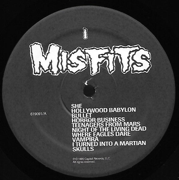 Image of Back Cover of LP - NEW/NEW - MISFITS, Misfits (Plan 9; PL9-09, US 2020 Reissue), , Vinyl LP repressing of this 1986 collection from the Punk legends. The compilation is officially titled Misfits, but is commonly referred to as Collection I and was made up as the first half of a pair with the later release of the compilation album Collection II. It includes several versions of songs that are exclusive to this compilation. - 2416350C