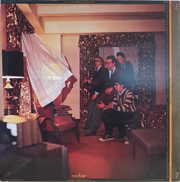 Image of Back Cover of LP - VG+/VG - ELVIS COSTELLO, This Year's Model (Radar Records; RAD 3, UK 1978, Copyright info on one line. EG on both sides. Porky on Side B.), "Special" twice in Side 1 runouts, not on Side 2.,  - 2526036E