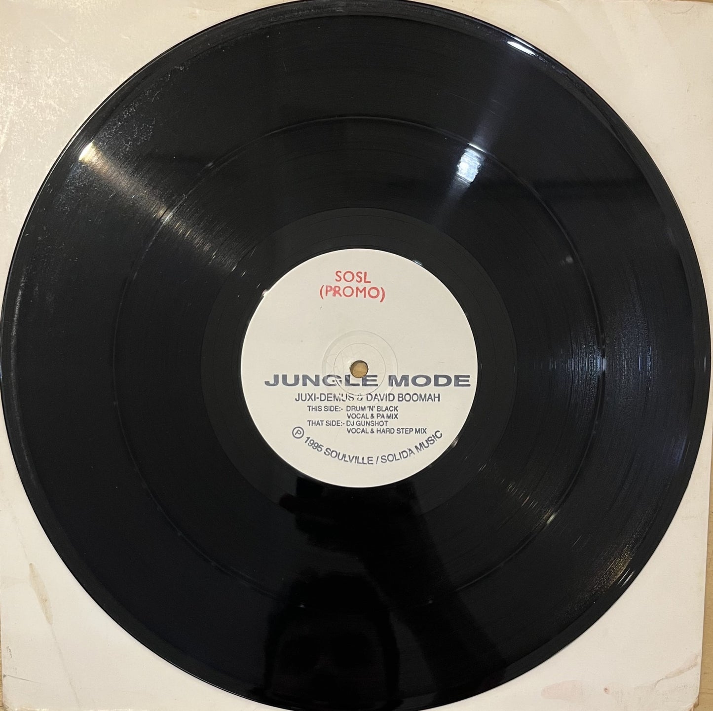Image of Front Cover of 12" - /G+ - JUXI DEMUS & DRUM 'N' BLACK, Jungle Mode (Junglist; JUNG 001, UK 1995, Stamped White Label), Hairlines and marks, notable scuffs at the edges on both sides, audible surface noise in quiet sections and intros to each track, with the occasional pop. Still a very playable copy., A		Jungle Mode (Original Vocal Mix)A		Jungle Mode (Instrumental)AA		Jungle Mode (Vocal Mix)AA		Jungle Mode (Hardstep Mix) - 2516170C