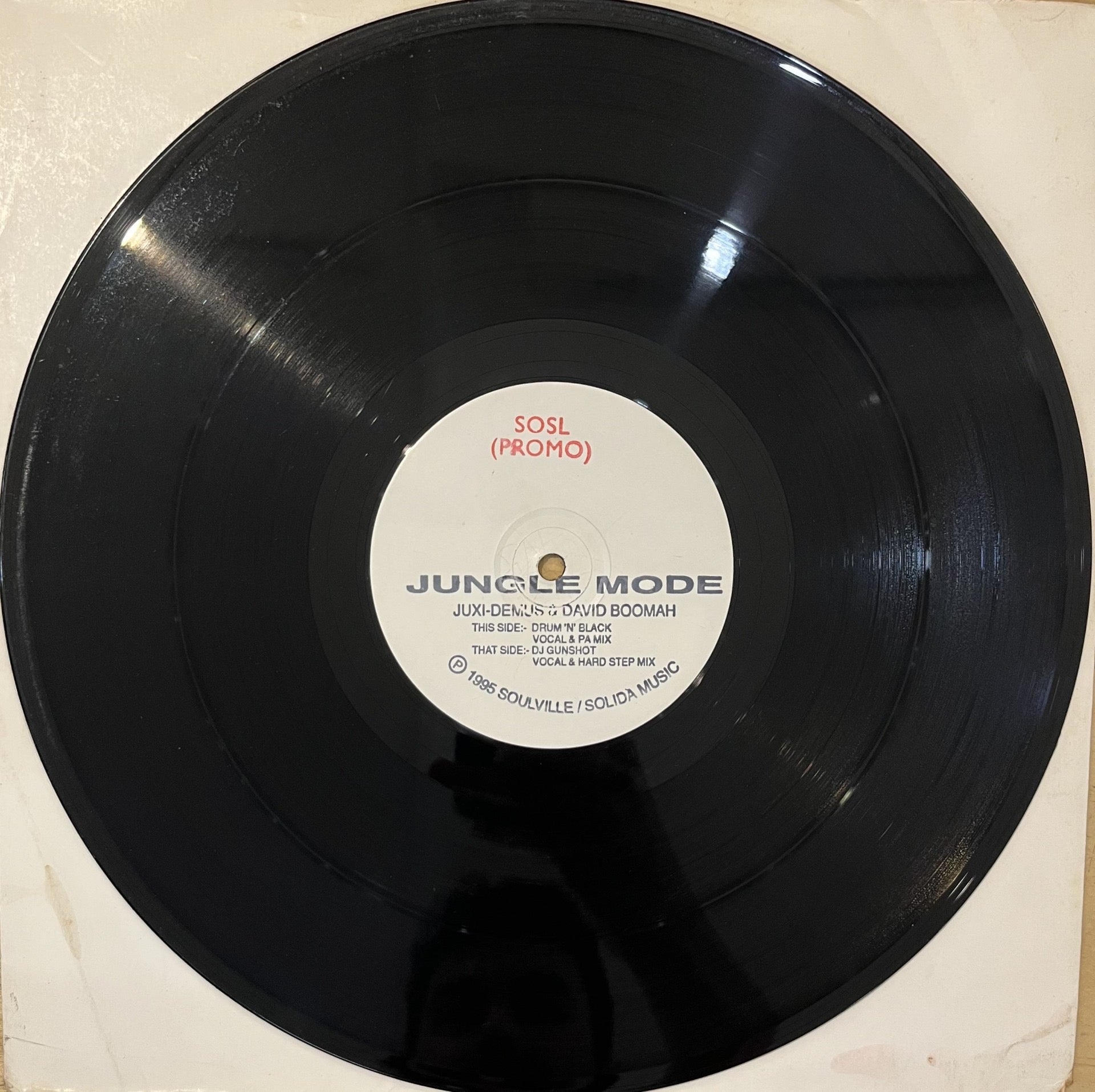 Image of Front Cover of 12" - /G+ - JUXI DEMUS & DRUM 'N' BLACK, Jungle Mode (Junglist; JUNG 001, UK 1995, Stamped White Label), Hairlines and marks, notable scuffs at the edges on both sides, audible surface noise in quiet sections and intros to each track, with the occasional pop. Still a very playable copy., A		Jungle Mode (Original Vocal Mix)A		Jungle Mode (Instrumental)AA		Jungle Mode (Vocal Mix)AA		Jungle Mode (Hardstep Mix) - 2516170C