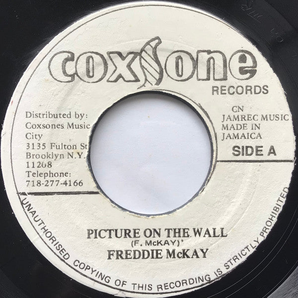 Image of Front Cover of 7" - /VG - FREDDIE MCKAY, Picture On The Wall (Coxsone Records; , Jamaica 1980s Reissue), Press flaws.,  - 2556105S