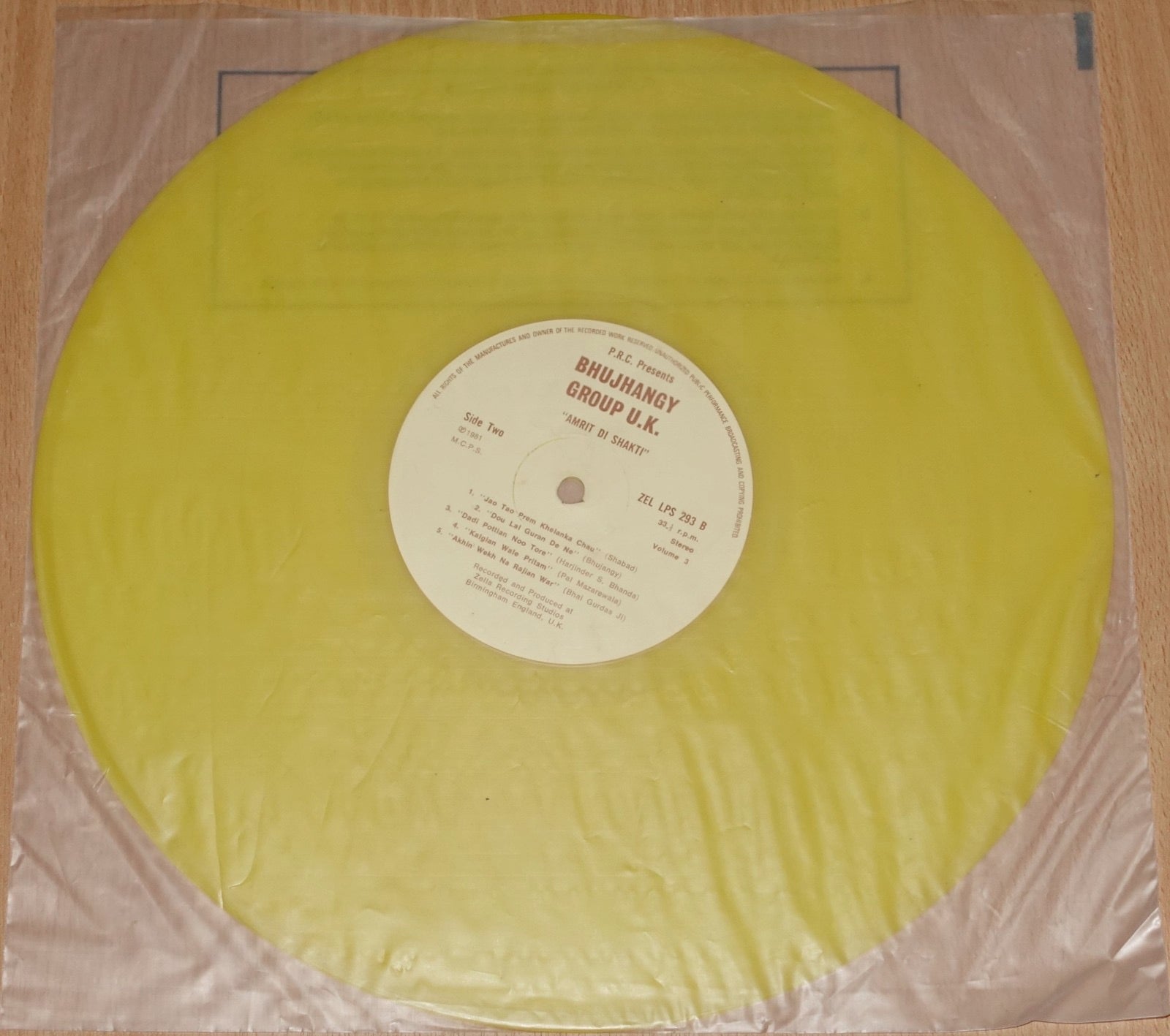 Image of Label Cover of LP - VG+/VG - BHUJHANGY GROUP, Amrit Di Shakti (Zella Recording Studios; ZEL LPS 293, UK 1981, Transparent Yellow Vinyl), Rare UK Punjabi Release! Disc has only some very light marks visible under a strong light. Plays nicely! Very minor wear to spine of sleeve.,  - 2516315C