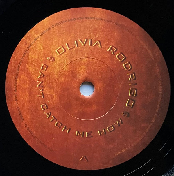 Image of Label Cover of 7" - VG+/EX - OLIVIA RODRIGO, Can't Catch Me Now (Geffen Records ; 602458598315, USA & Europe 2023, Picture Sleeve, One Side Etched), Sleeve Creased,  - 2526298E