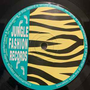Image of Back Cover of 12" - /VG+ - TENOR FLY MEETS JONNIE CLARKE*, Born In The Ghetto / Rude Boy Talk (Jungle Fashion Records; JFT003, UK 1994), one or two whispy hairlines - minor,  - 2546291S