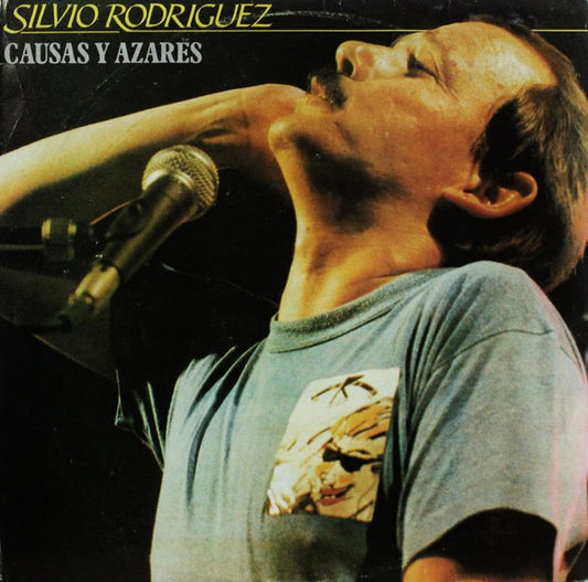 Image of Front Cover of 2xLP - G+/VG - SILVIO RODR GUEZ, Causas Y Azares (Fonomusic; 90.2040/3-F-1-G, Cuba 1986, Gatefold), Tear to sleeve opening. Disc has some storage marks but is otherwise clean!,  - 2616144C