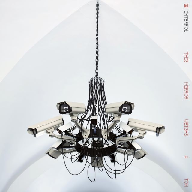 Image of Front Cover of 2xLP - NEW/NEW - INTERPOL, This Mirror Weighs A Ton (Partisan; PTSN3068-1, UK 2026, Gatefold, Standard Black Vinyl), , 'This Mirror Weighs a Ton' finds Interpol turning inward while continuing to move forward. Across the record, reflection, distortion and perception become a lens through which familiar shapes are refracted into something slightly alien, as if seen through a different kind of light. Synthesizers, strings, acoustic guitars and percussion are integrated into the fabric 