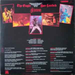 Image of Back Cover of LP - VG/VG+ - SAXON, The Eagle Has Landed (Live) (Carrere; CAL 137, UK 1982, Embossed Sleeve, Stickered Sleeve), Hype sticker still intact, sticker damage & old sticker remnants, edge wear,  - 2746022S