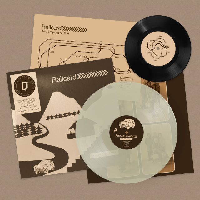 Image of Front Cover of LP - NEW/NEW - RAILCARD, Two Steps At A Time - Dinked Edition (Skep Wax Records; SKEPWAX046DLP, UK 2026, Insert Lyric Sheet, A4 Poster, Dinked No. 426, Natural Clear Vinyl, Bonus 7" single with two exclusive tracks, Limited of 300), , It wasn’t until 2025 that Rachel Love (Dolly Mixture), Ian Button and Peter Momtchiloff (Heavenly) met at a gig, realised that they were exactly the same age, and decided that this was an excellent reason to form a new band.  The shared history, the sa