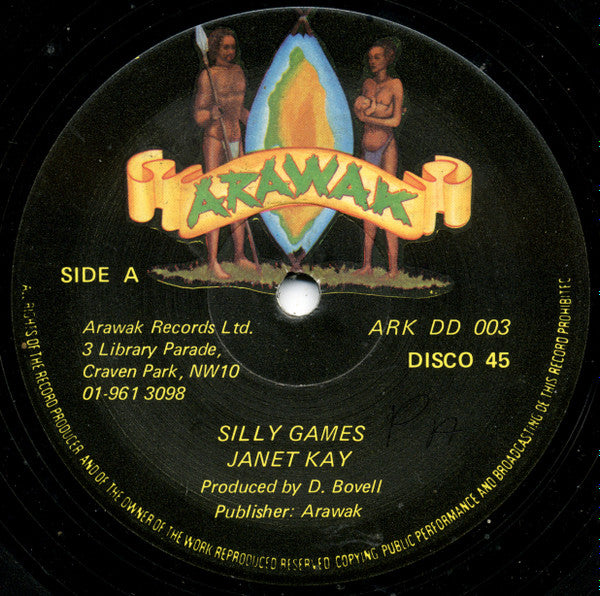 Image of Front Cover of 12" - VG/VG - JANET KAY, Silly Games (Arawak; ARK DD 003, UK 1979, Reggae Disco 45 Sleeve), Lots of light lines, plays VG or better. Sticker residue on sleeve.,  - 2826164E