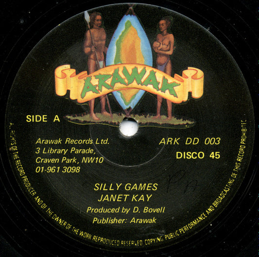 Image of Front Cover of 12" - VG/VG - JANET KAY, Silly Games (Arawak; ARK DD 003, UK 1979, Reggae Disco 45 Sleeve), Lots of light lines, plays VG or better. Sticker residue on sleeve.,  - 2826164E