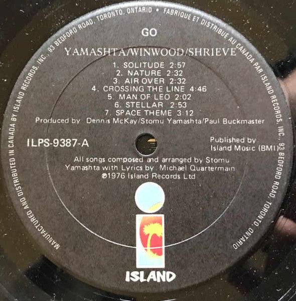 Image of Label Cover of LP - VG/VG+ - STOMU YAMASHTA / STEVE WINWOOD / MICHAEL SHRIEVE, Go (Island Records With Rim Text; ILPS 9387, Canada 1976), Cut-out (corner cut & notched).,  - 2816157C
