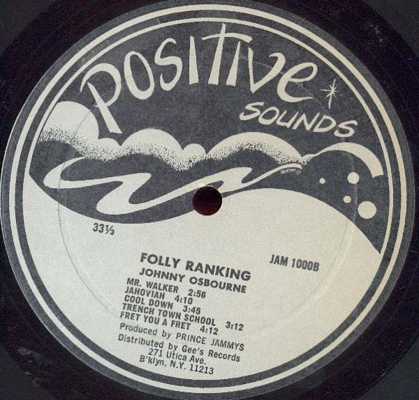 Image of Back Cover of LP - G/VG - JOHNNY OSBOURNE, Folly Ranking (Positive Sounds; JAM1000, US 1980), WOL. One label misaligned but not on grooves so doesn't impede playback. Record has light hairlines - nothing serious. Sleeve has writing and staining, split spine. ,  - 2926003E