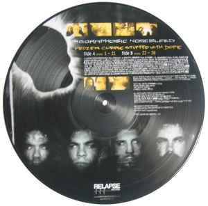 Image of Back Cover of LP - G/VG+ - AGORAPHOBIC NOSEBLEED, Frozen Corpse Stuffed With Dope (Relapse Records; RR 6530-1, USA & Europe 2002, Clear Plastic Stickered Sleeve, Picture Disc, Ltd to 1000), seam splits on all edges of plastic sleeve,  - 2946069S