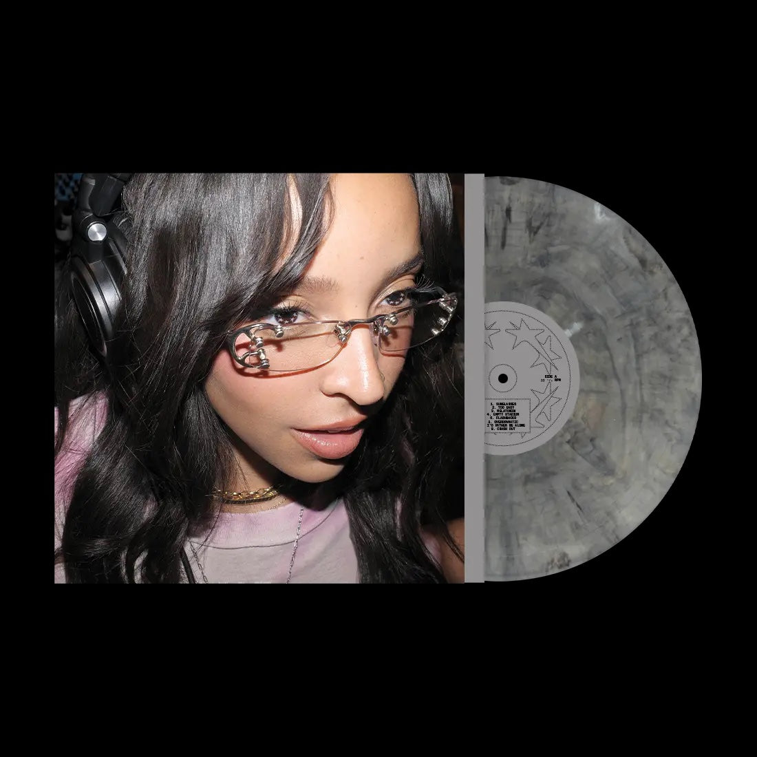 Image of Back Cover of LP - NEW/NEW - TINASHE, Popstar (Atlantc; , Europe 2026, Gatefold, 140g Black & Silver Vinyl), , Popstar, the new album from multi-platinum certified singer, songwriter, producer and DJ Tinashe, redefines her version of what a Popstar is. Following her back to back #1 chart hits “Nasty” and “No Broke Boys” with Disco Lines, Popstar captures Tinashe as the most honest version of herself, where she is no longer allowing anyone to box her in or categorise her in one genre. - 9407830C