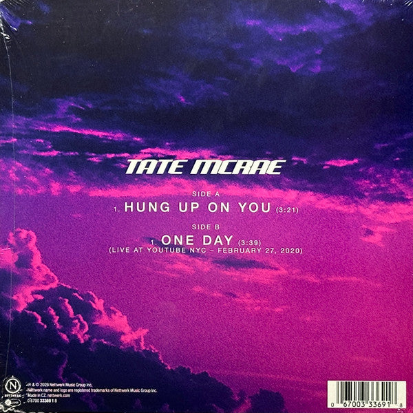 Image of Back Cover of 7" - EX/EX - TATE MCRAE, Hung Up On You / One Day (Live From Youtube NYC - February 27, 2020) (Nettwerk; 333691, UK 2026, Black Inner, RSD Release 2026, Neon Violet Vinyl), Still in hype stickered shrinkwrap,  - 2956371S