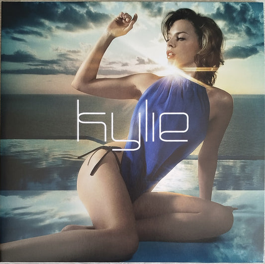 Image of Front Cover of 2xLP - NEW/NEW - KYLIE MINOGUE, Light Years (Parlophone; 5021732253330, Worldwide 2026 Reissue, Gatefold, 2 Inners, Black Vinyl), , Kylie s first album with Parlophone shot Kylie back into pop stardom, with a blend of dance-pop, disco and Europop spawning singles such as On A Night Like This, Kids with Robbie Williams, and her big comeback single Spinning Around. - 3236015E