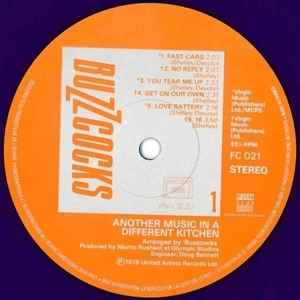 Image of Label Cover of LP - VG/VG+ - BUZZCOCKS, Another Music In A Different Kitchen (Fan Club; FC 021, France 1987 Reissue, Inner, Blue Vinyl), Light edge & ring wear,  - 3046232S