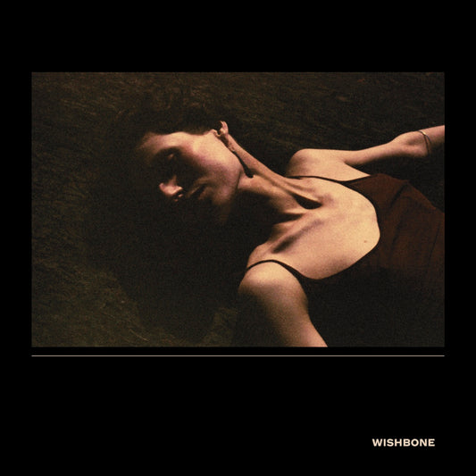 Image of Front Cover of CD - NEW/NEW - CLARA MANN, Wishbone (The state51 Conspiracy; CON1046CD, UK 2026), , Clara Mann’s luminous new album, Wishbone, is built on contrast; the brightest passages made legible by shadow, as Mann strove to picture a beautiful life and then to allow herself to want it, with absolute vulnerability. Leaning deliberately into the songwriting tradition, Mann reached for the rough-edged, performance-driven spirit of artists like Fiona Apple and Tom Waits; while keeping faith with