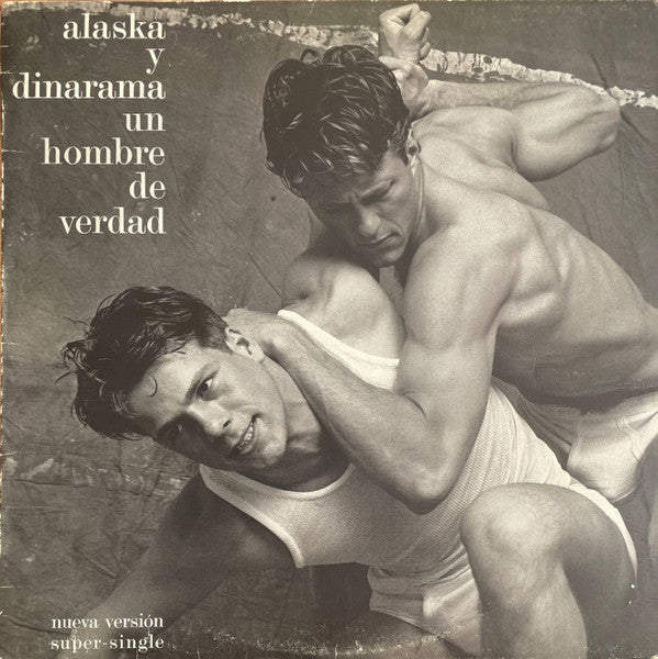 Image of Front Cover of 12" - VG/VG - ALASKA Y DINARAMA, Un Hombre De Verdad (Hispavox; (49) 549 180, Spain 1985, Picture Sleeve), light marks only. sticker peel marks top right front sleeve - minor,  - 3146047S