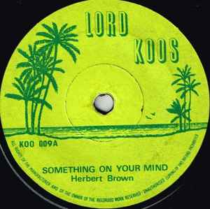 Image of Front Cover of 7" - /G+ - HUBERT LEE, TOMMY MCCOOK & JIMMY ELLIS, Something On Your Mind / Sabotage (Lord Koos; KOO 009, UK 1973), Marks on vinyl. Plays OK.,  - 3256060S