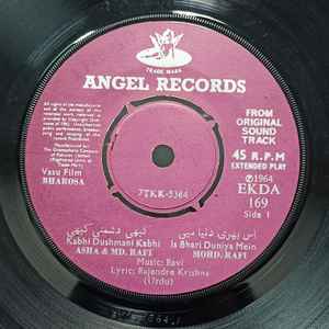Image of Label Cover of 7" EP - VG/VG+ - RAVI  SHANKAR-JAIKISHAN, Bharosa / Daag (Angel Records; EKDA 169, Pakistan 1964), Wear to sleeve with ringwear and previous sticker rips., A1 - Mohammed Rafi - Is Bhari Duniya MeinA2 - Asha Bhosle, Mohammed Rafi - Kabhi Dushmani KabhiDaag	B1 - Talat Mahmood - Hum Dard Ke MaroonB2 - Talat Mahmood - Koi Nahin Mera Is - 3256072S