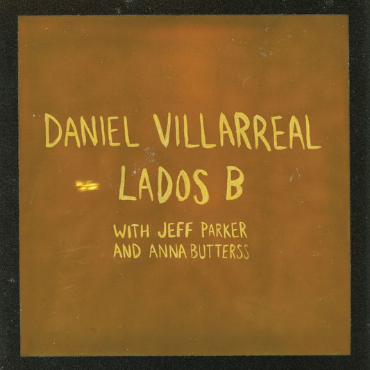 Image of Front Cover of 1xLP - NEW/NEW - DANIEL VILLARREAL, JEFF PARKER & ANNA BUTTERSS, Lados B (2026 Edition) (International Anthem; IARC71LPX, UK 2026, Orange Vinyl), , Lados B is a deep dive into the high-level spontaneous music made by Villarreal, Parker, and Butterss across those two days in 2020. Villarreal is heard leading the group through various rhythmic modes and structures for improvisation – flow as informed by the Latin funk of Fania Records as it is by the otherworldly humanity trance of Bra