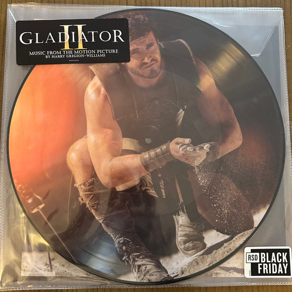 Image of Front Cover of 2xLP - VG/EX - HARRY GREGSON-WILLIAMS, Gladiator II (Music From The Motion Picture) (Decca; 602475136514, Worldwide 2024, Stickered Gatefold Plastic Outer, Picture Disc, RSD 2024 Exclusive), Seam split to bottom edge of plastic outer.,  - 3226290E
