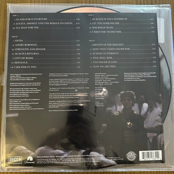 Image of Back Cover of 2xLP - VG/EX - HARRY GREGSON-WILLIAMS, Gladiator II (Music From The Motion Picture) (Decca; 602475136514, Worldwide 2024, Stickered Gatefold Plastic Outer, Picture Disc, RSD 2024 Exclusive), Seam split to bottom edge of plastic outer.,  - 3226290E
