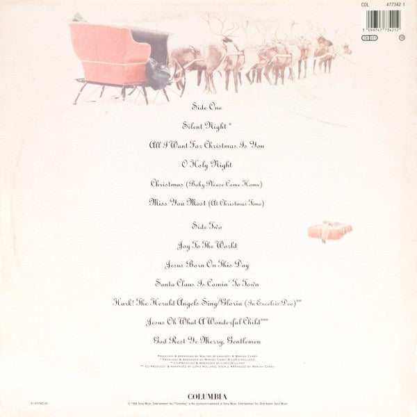 Image of Back Cover of LP - EX/VG - MARIAH CAREY, Merry Christmas (Columbia; 477342 1, UK & Europe 1994, Inner), Vinyl strong VG, a few light hairlines. Sleeve still in opened shrinkwrap.,  - 3316152C