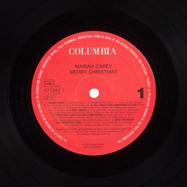 Image of Label Cover of LP - EX/VG - MARIAH CAREY, Merry Christmas (Columbia; 477342 1, UK & Europe 1994, Inner), Vinyl strong VG, a few light hairlines. Sleeve still in opened shrinkwrap.,  - 3316152C