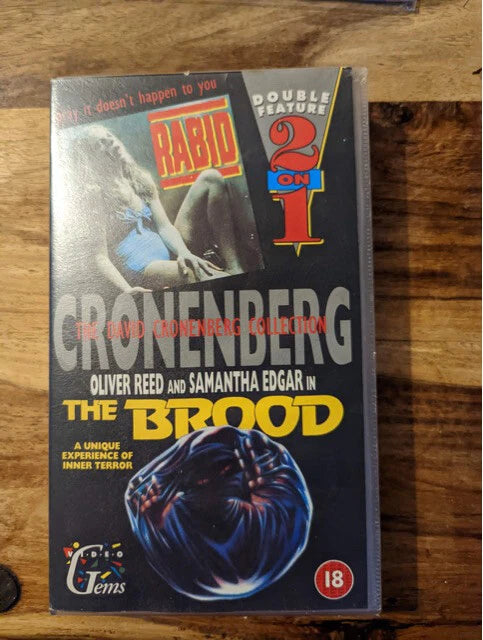 Image of Front Cover of VHS - VG/VG+ - DAVID CRONENBERG, Rabid / The Brood (, US ), Wear to case,  - 3356206S