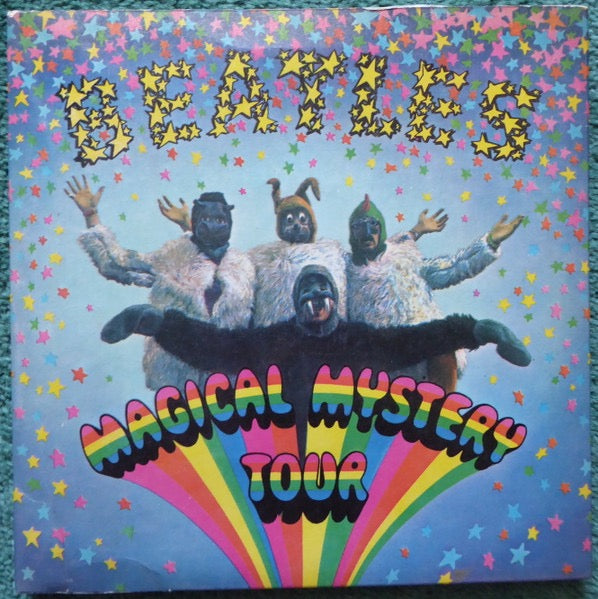 Image of Front Cover of 2x7" EP - VG/VG+ - THE BEATLES, Magical Mystery Tour (Parlophone ; MMT 1, UK 1967, Gatefold With Stapled In Booklet, Blue Lyric Sheets, Mono, Push Out Centres, Label Variation; Year Printed Directly Above Side Indicator On Second Disc Only), Clean glossy discs, Sleeve a little sunfaded and has an old shop stamp on inside cover ,  - 3316517C