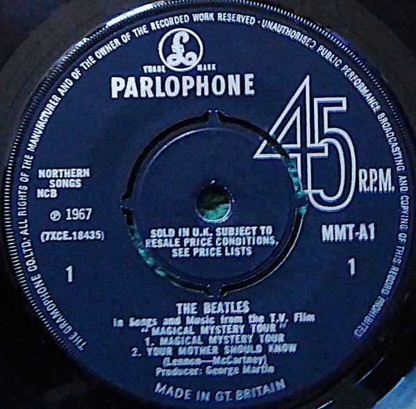 Image of Back Cover of 2x7" EP - VG/VG+ - THE BEATLES, Magical Mystery Tour (Parlophone ; MMT 1, UK 1967, Gatefold With Stapled In Booklet, Blue Lyric Sheets, Mono, Push Out Centres, Label Variation; Year Printed Directly Above Side Indicator On Second Disc Only), Clean glossy discs, Sleeve a little sunfaded and has an old shop stamp on inside cover ,  - 3316517C