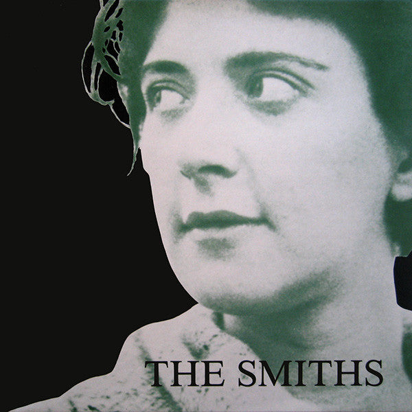 Image of Front Cover of 12" - VG/G+ - THE SMITHS, Girlfriend In A Coma (Rough Trade; RTT 197, UK 1987, Green Tint Sleeve, Black Die Cut Inner, EMI Pressing, Alternate Mastering Source), Mottling and hairlines. Light edge and ring wear, indents to sleeve.,  - 3446201S