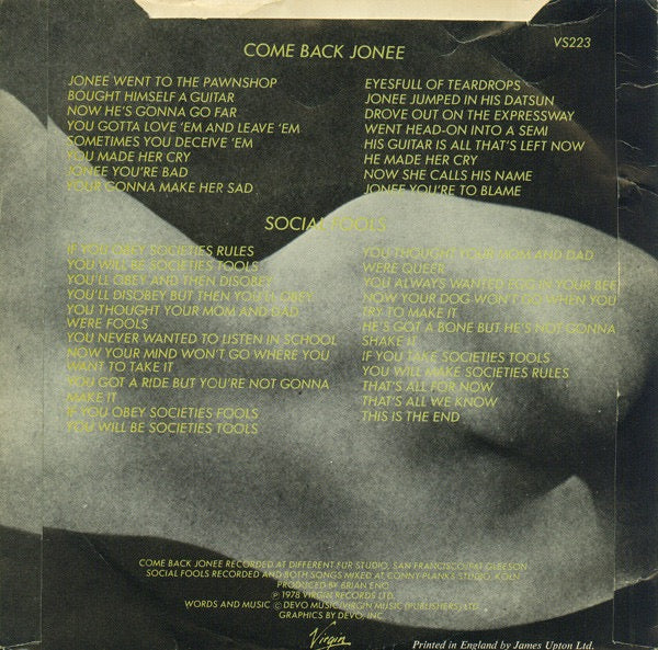 Image of Back Cover of 7" - VG/VG - DEVO, Come Back Jonee (Virgin Solid Centre Grey Labels With White Text Logo; VS 223, UK 1978, Stickered Picture Sleeve, Grey Vinyl), Strong VG, Head sticker stuck neatly to sleeve,  - 3416343C