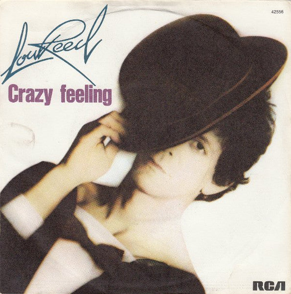 Image of Front Cover of 7" - G+/G - LOU REED, Crazy Feeling (RCA Victor Orange Label; 42556, France 1976, Picture Sleeve, Large Centre), Some light marks and hairlines, Sleeve intact but has ring wear and splodge on rear. ,  - 3416344C