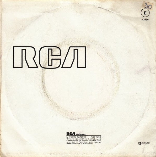 Image of Back Cover of 7" - G+/G - LOU REED, Crazy Feeling (RCA Victor Orange Label; 42556, France 1976, Picture Sleeve, Large Centre), Some light marks and hairlines, Sleeve intact but has ring wear and splodge on rear. ,  - 3416344C