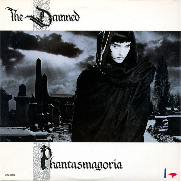 Image of Front Cover of LP - VG/VG - THE DAMNED, Phantasmagoria (MCA Records; MCA-39039, US 1985, Gold Promo Stamp on Rear Sleeve, Gloversville Pressing), Edge and ring wear, light moisture stains on cover. Sticker on rear cover. Paper scuffs on disc.,  - 3546153S