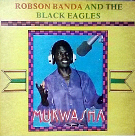 Image of Front Cover of LP - G+/VG - ROBSON BANDA AND THE BLACK EAGLES, Mukwasha (Kumusha; KSALP 127, Zimbabwe 1990, Picture Sleeve), Sleeve intact, but has 2 seam splits and is a bit grubby.,  - 3526067E