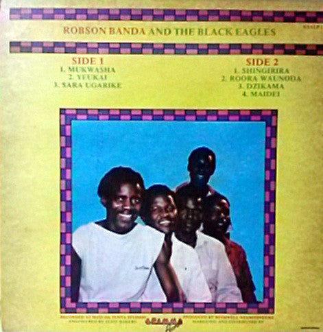 Image of Back Cover of LP - G+/VG - ROBSON BANDA AND THE BLACK EAGLES, Mukwasha (Kumusha; KSALP 127, Zimbabwe 1990, Picture Sleeve), Sleeve intact, but has 2 seam splits and is a bit grubby.,  - 3526067E