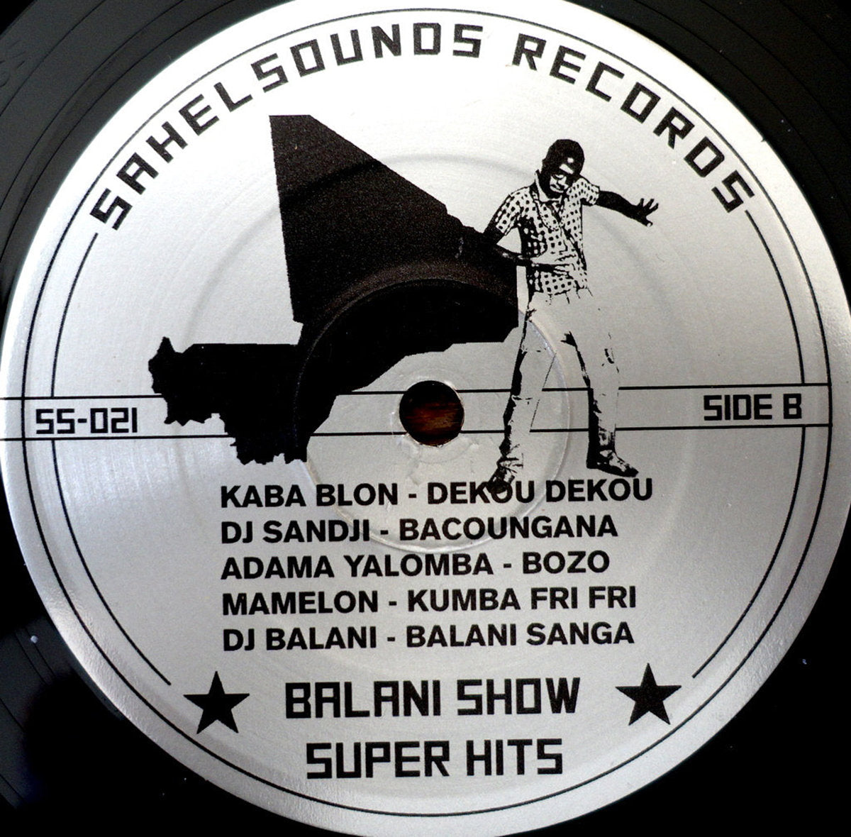 Image of Back Cover of LP - VG+/VG+ - VARIOUS, Balani Show Super Hits - Electronic Street Parties From Mali (Sahel Sounds; SS-021, US 2014, Picture Sleeve), , Compilation of popular music played at street parties in Mali. Drawing from across the past decade of Balani Shows, from innovators to contemporary stars of the scene, these are some of the Malian compositions in heavy rotation.Colloquially known as "Balani Show," these street parties began in the late 90s in the capital city of Bamako. Unable to aff